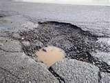Image 1 for If you spot a pothole ring Clarence on 0800 2323