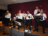 Click for a larger image of August - The Golden Eagle Jazz Band