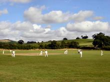 Click for a larger image of St James in the shadow of Win Green